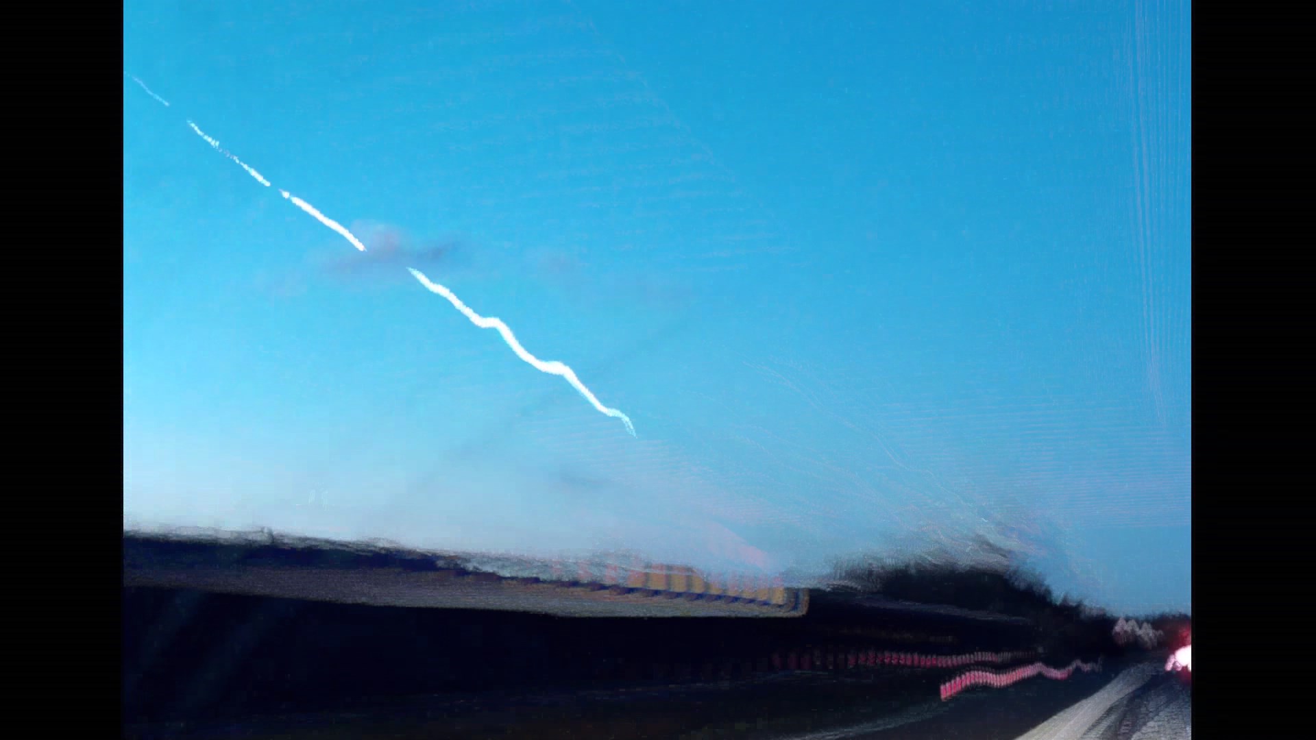 Fig. 5: A video clip of the fireball 20171125_071306 from a dashboard camera in the car, M5 highway near Churchdown. Author: Craig Low